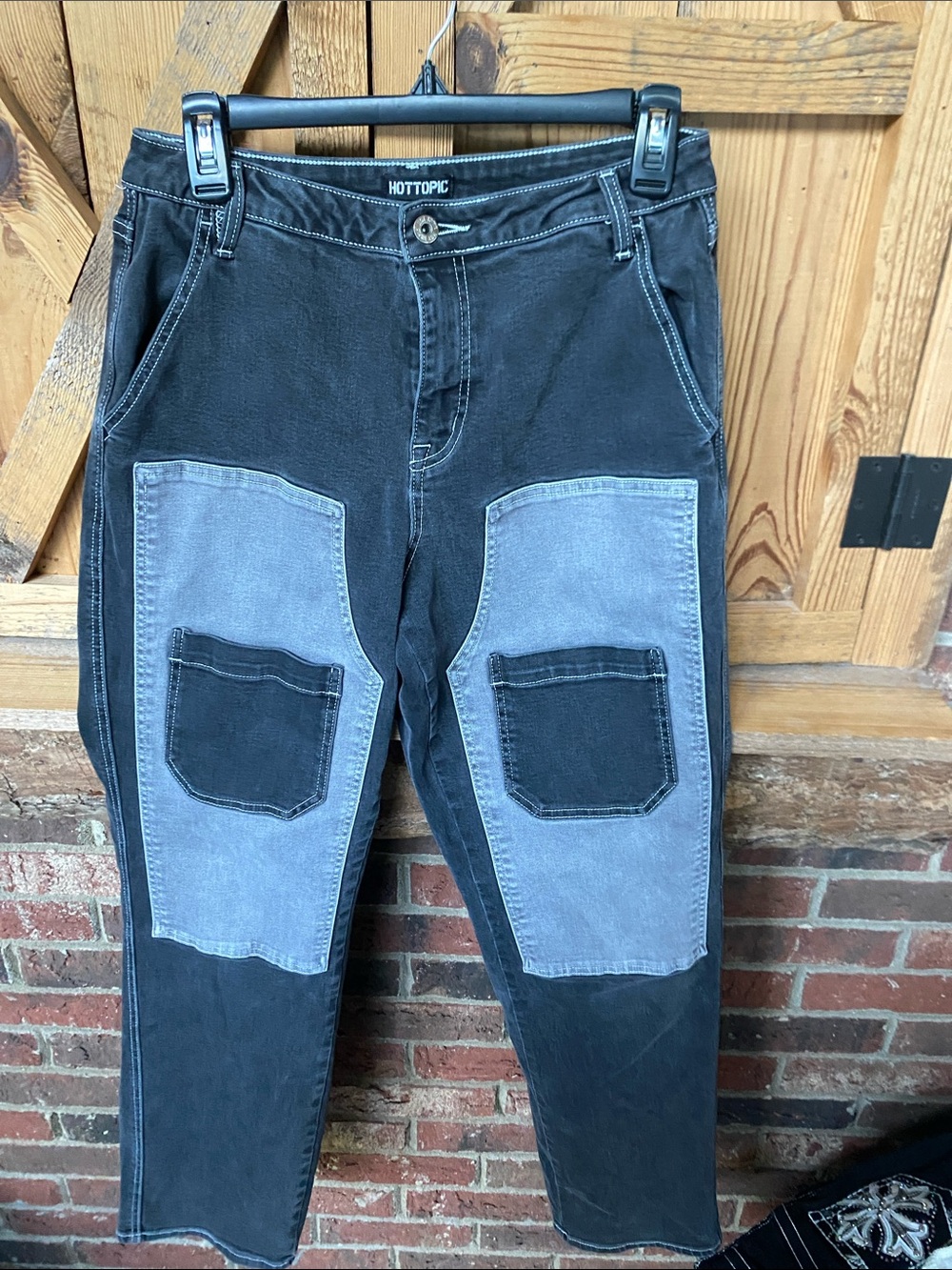 Hot Topic Women’s Black Pants with Gray Patch Panels size 9 blemish on pants leg